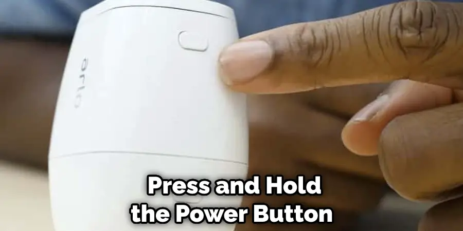 Press and Hold  the Power Button  