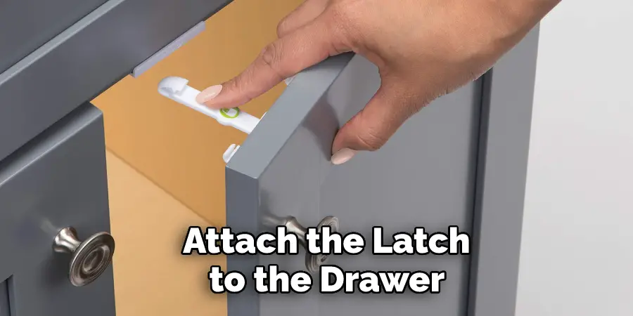Attach the Latch to the Drawer 