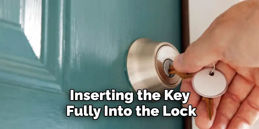 Inserting the Key Fully Into the Lock