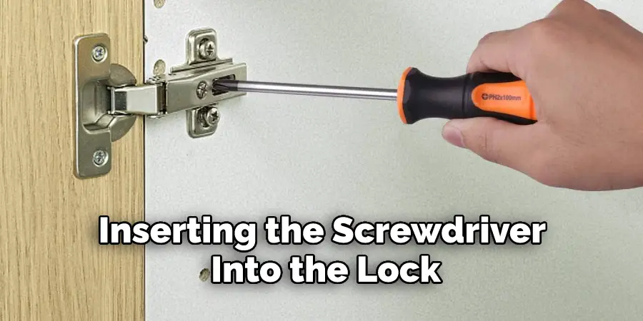 Inserting the Screwdriver Into the Lock