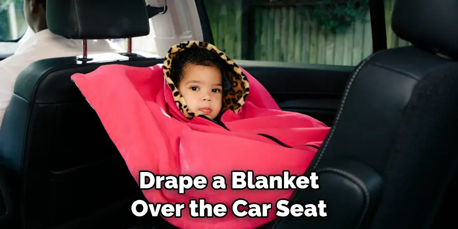 Drape a Blanket Over the Car Seat