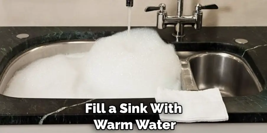 Fill a Sink With Warm Water