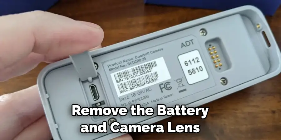 Remove the Battery and Camera Lens