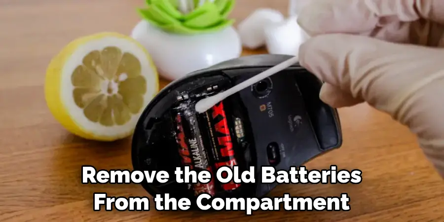 Remove the Old Batteries From the Compartment