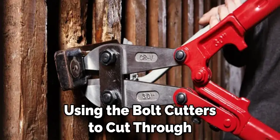 Using the Bolt Cutters to Cut Through