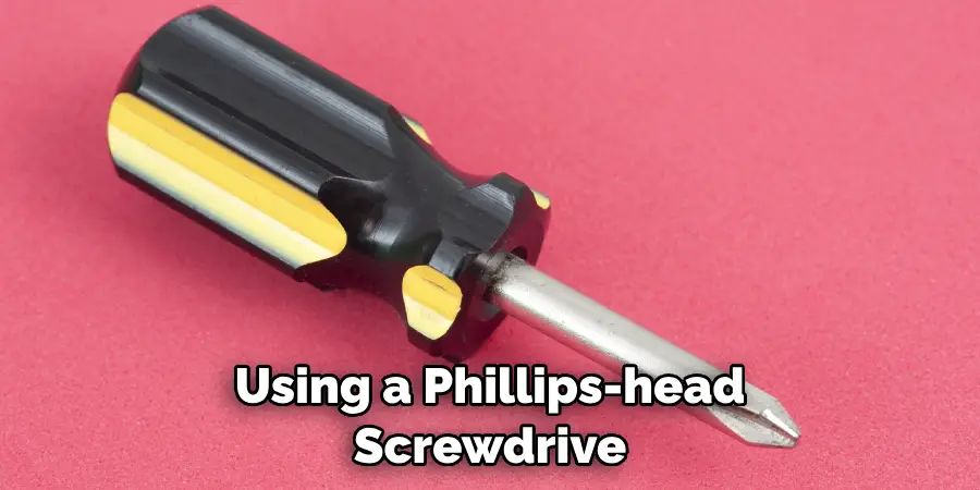 Using a Phillips-head Screwdrive