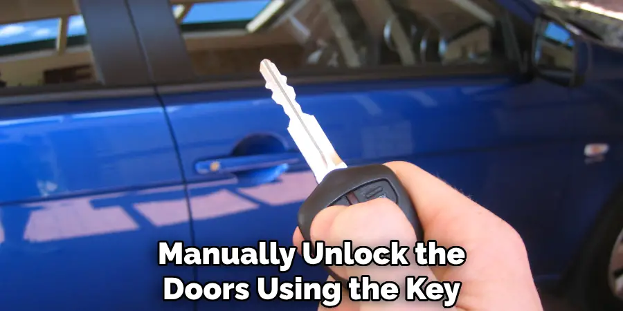 Manually Unlock the Doors Using the Key