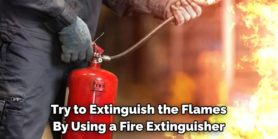 Try to Extinguish the Flames
By Using a Fire Extinguisher