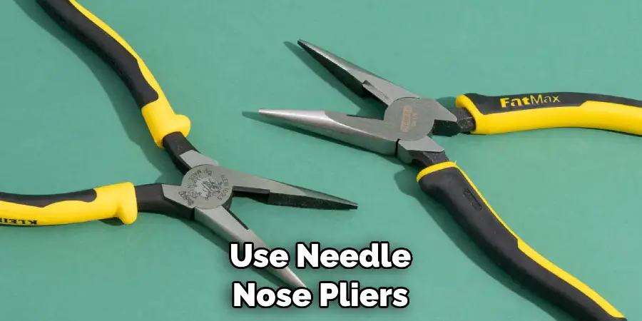 Use Needle Nose Pliers