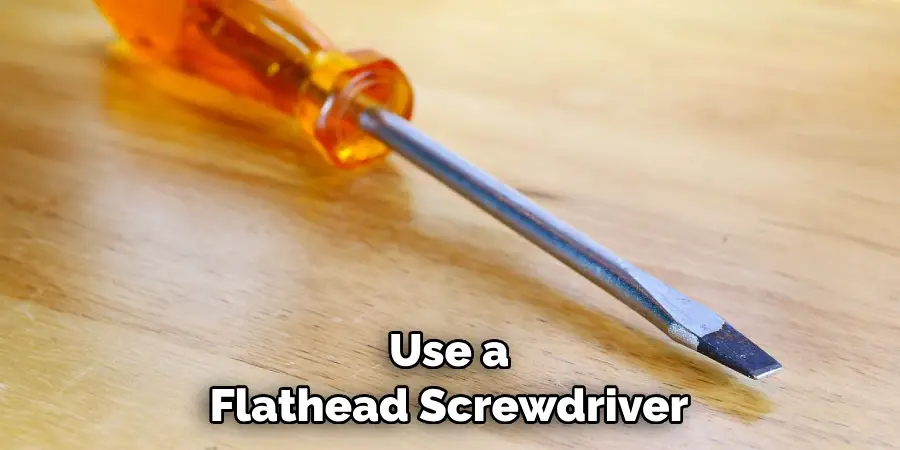 Use a Flathead Screwdriver