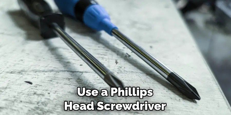 Use a Phillips Head Screwdriver