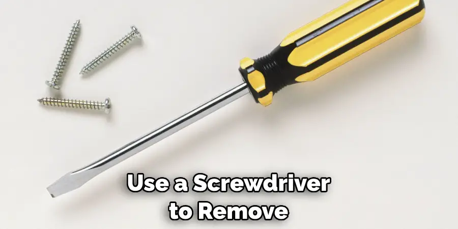 Use a Screwdriver to Remove