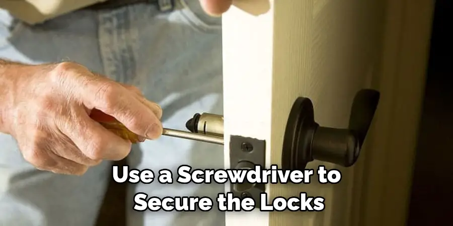 Use a Screwdriver to Secure the Locks