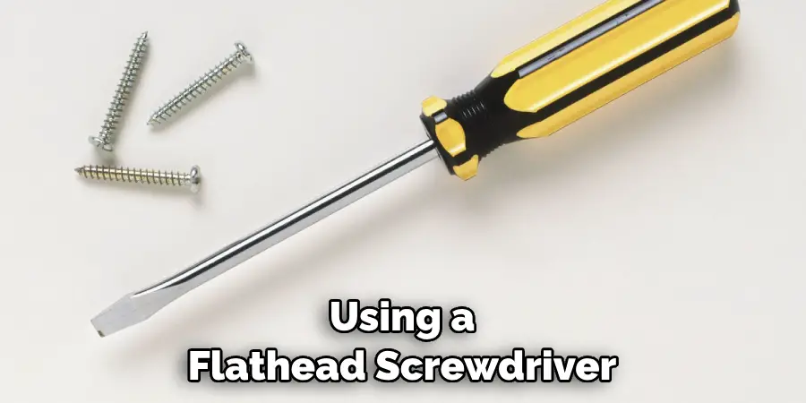 Using a Flathead Screwdriver