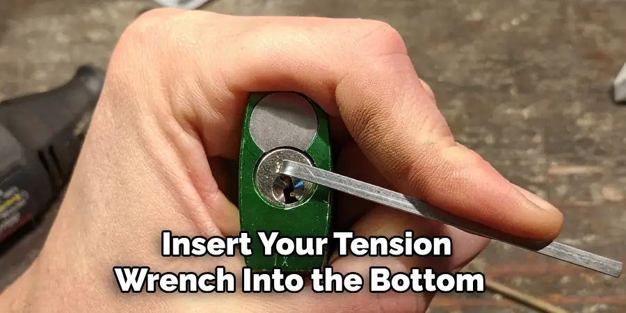  Insert Your Tension Wrench Into the Bottom 