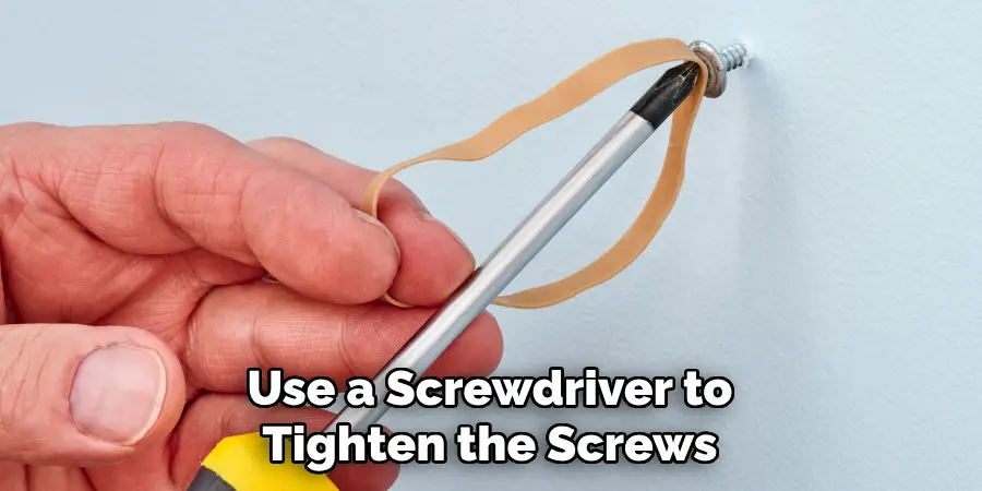 Use a Screwdriver to Tighten the Screws