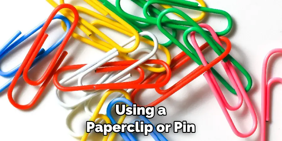 Using a Paperclip or Pin