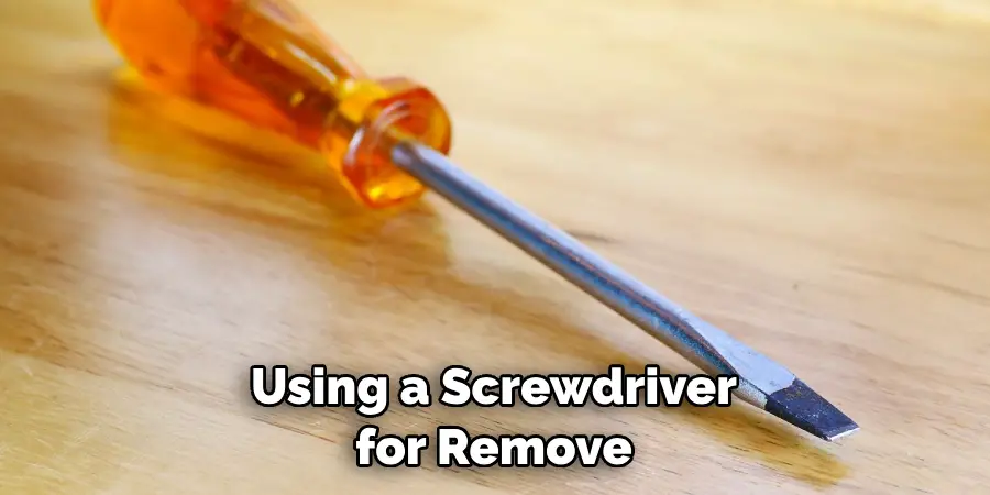 Using a Screwdriver for Remove