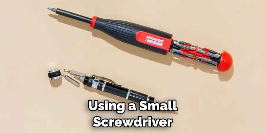 Using a Small Screwdriver