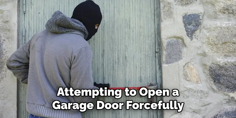 Attempting to Open a Garage Door Forcefully
