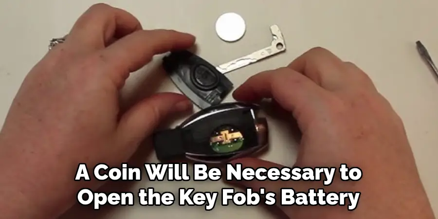 A Coin Will Be Necessary to Open the Key Fob's Battery