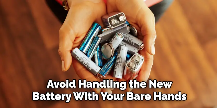 Avoid Handling the New Battery With Your Bare Hands