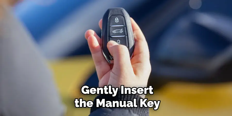 Gently Insert
the Manual Key
