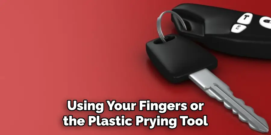 Using Your Fingers or the Plastic Prying Tool