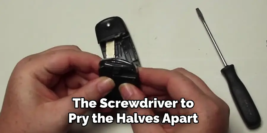 The Screwdriver to Pry the Halves Apart