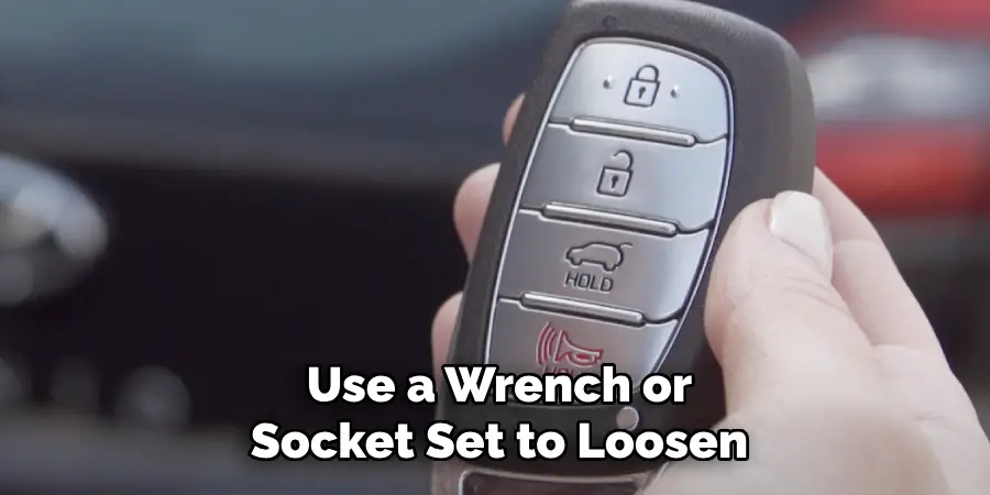 Use a Wrench or Socket Set to Loosen
