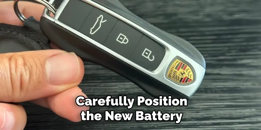 Carefully Position the New Battery