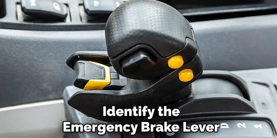 Identify the
Emergency Brake Lever