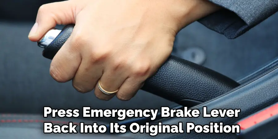 Press Emergency Brake Lever
Back Into Its Original Position