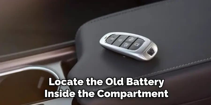 Locate the Old Battery Inside the Compartment