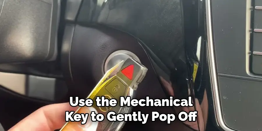 Use the Mechanical Key to Gently Pop Off