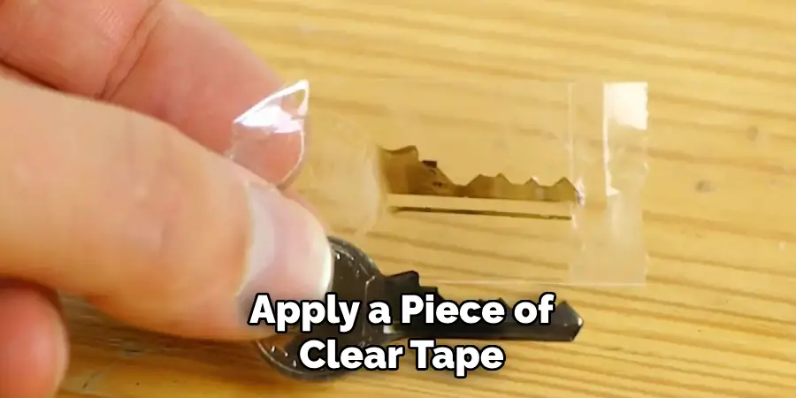 Apply a Piece of
Clear Tape
