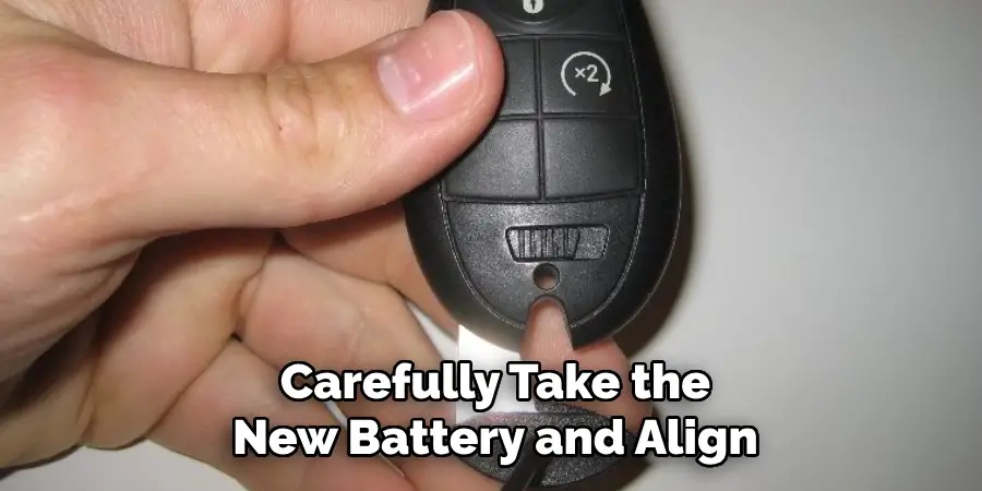 Carefully Take the New Battery and Align