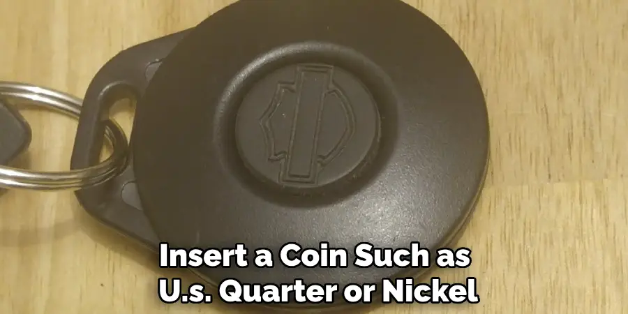 Insert a Coin Such as 
U.s. Quarter or Nickel
