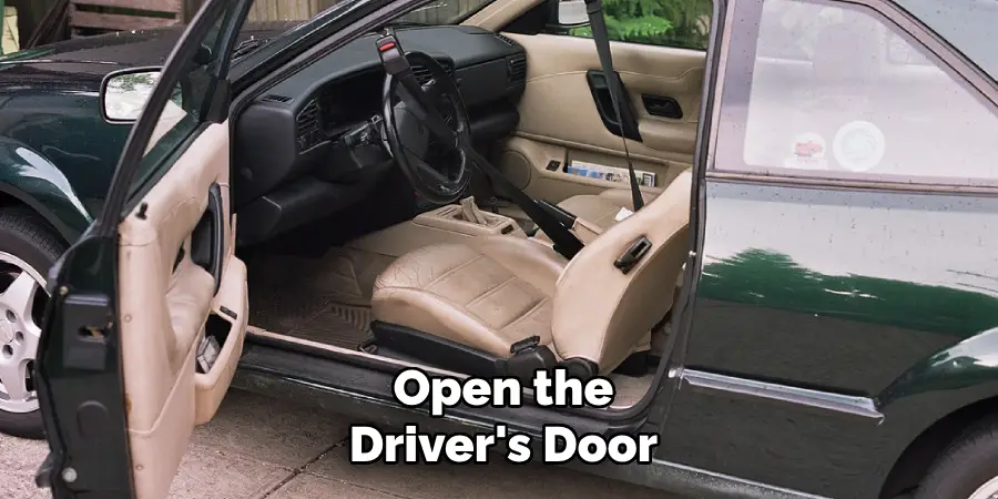 Open the
Driver's Door