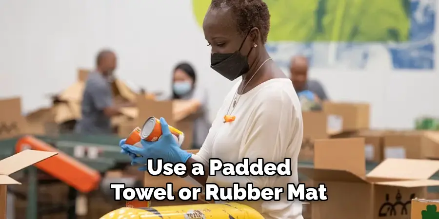 Use a Padded Towel or Rubber Mat