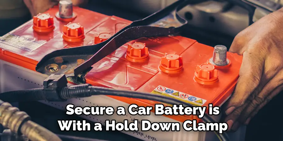 Secure a Car Battery is With a Hold Down Clamp
