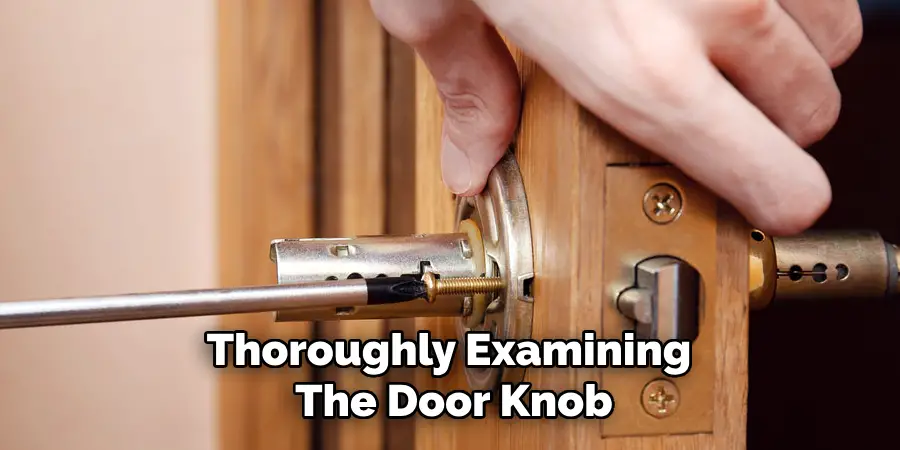 Thoroughly Examining
The Door Knob