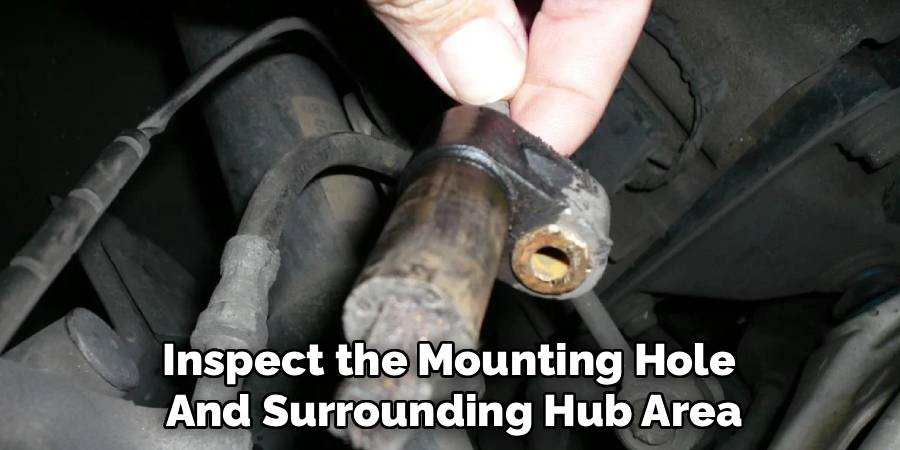 Inspect the Mounting Hole
And Surrounding Hub Area
