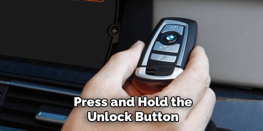 Press and Hold the Unlock Button