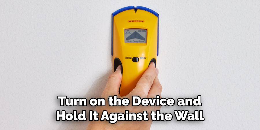 Turn on the Device and 
Hold It Against the Wall 
