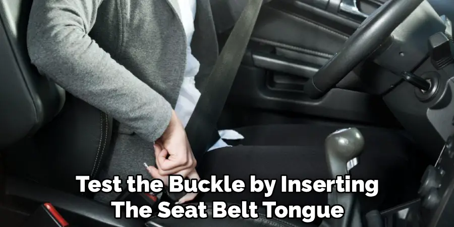 Test the Buckle by Inserting The Seat Belt Tongue