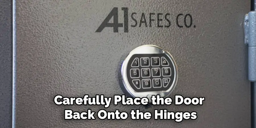 Carefully Place the Door
 Back Onto the Hinges