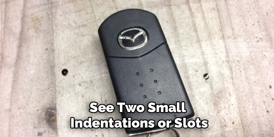 See Two Small 
Indentations or Slots